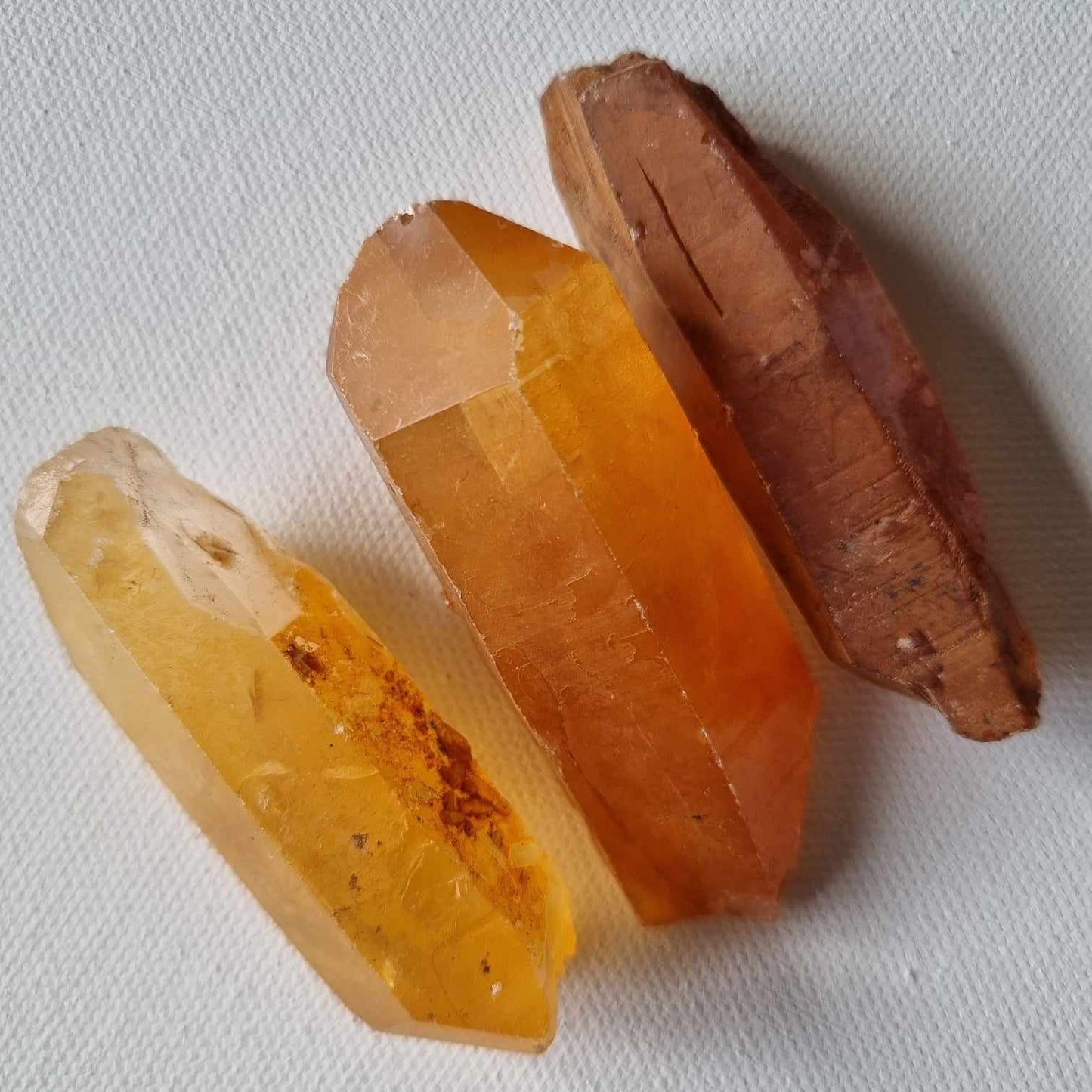 Three orange raw points on a white background