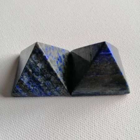 Lapis pyramids on a white background