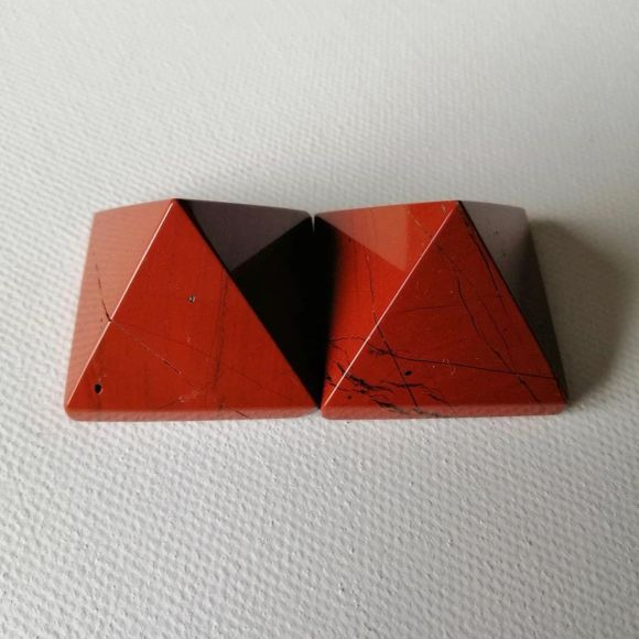 Red pyramids on a white background