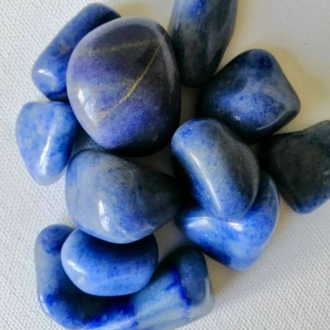 Blue stones on a white background