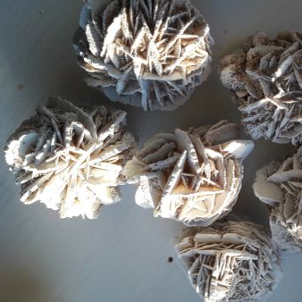 Decorative spherical crystals with textured surface on a white background