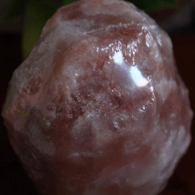 Himalayan salt lamp on a dark background
