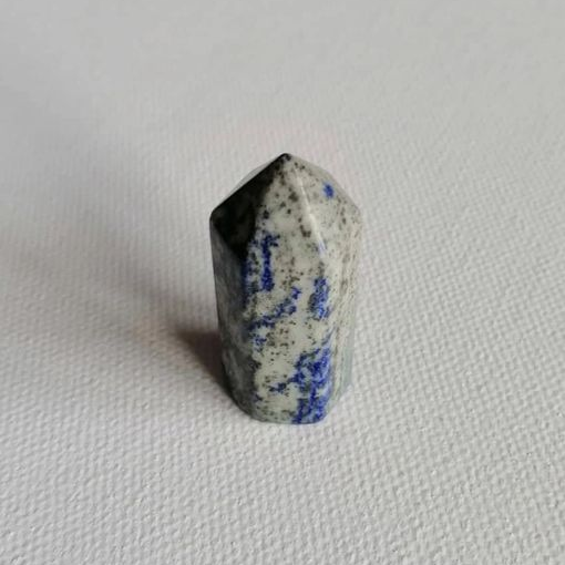 Lapis mini point on a textured white surface