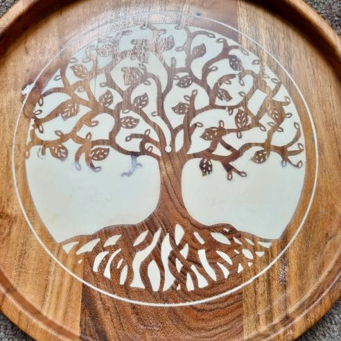 Wooden tray with a tree of life design
