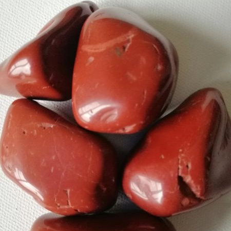 Red stones on a white background