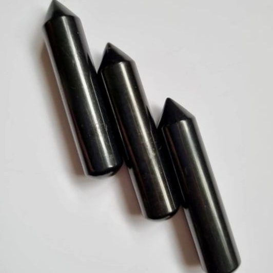 Three massage wands on a light gray background