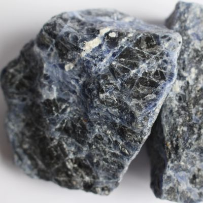 Two rough stones on a white background