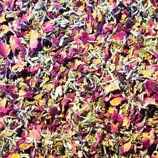 Colorful dried flower petals scattered on a surface