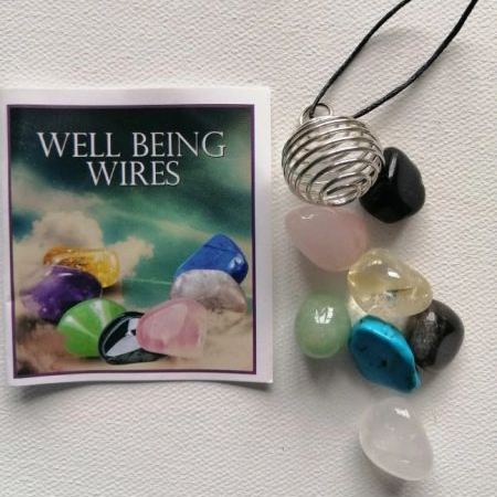 Necklace with colorful beads and a silver spiral pendant next to a 'Well Being Wires' product card on a white background